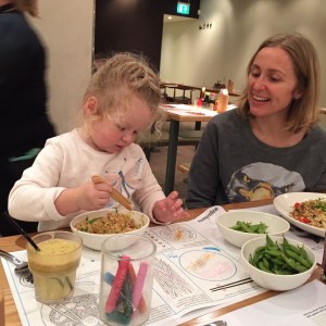 Trying out chopsticks for the first time on one of our weekend adventures